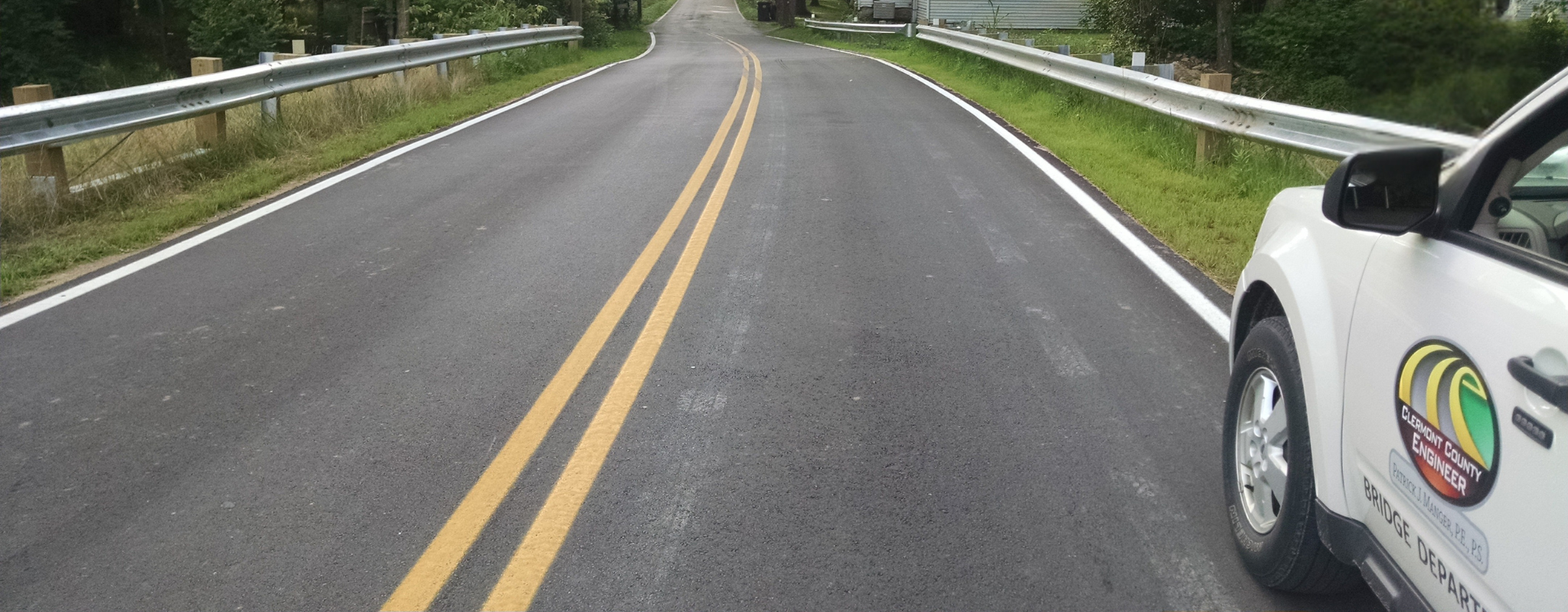 Road with bridge department truck